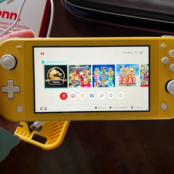 Nintendo Switch Lite with game and accessories!